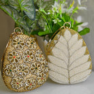 Almond Clutch with Bangle Styled Handle - RajsiPoshak